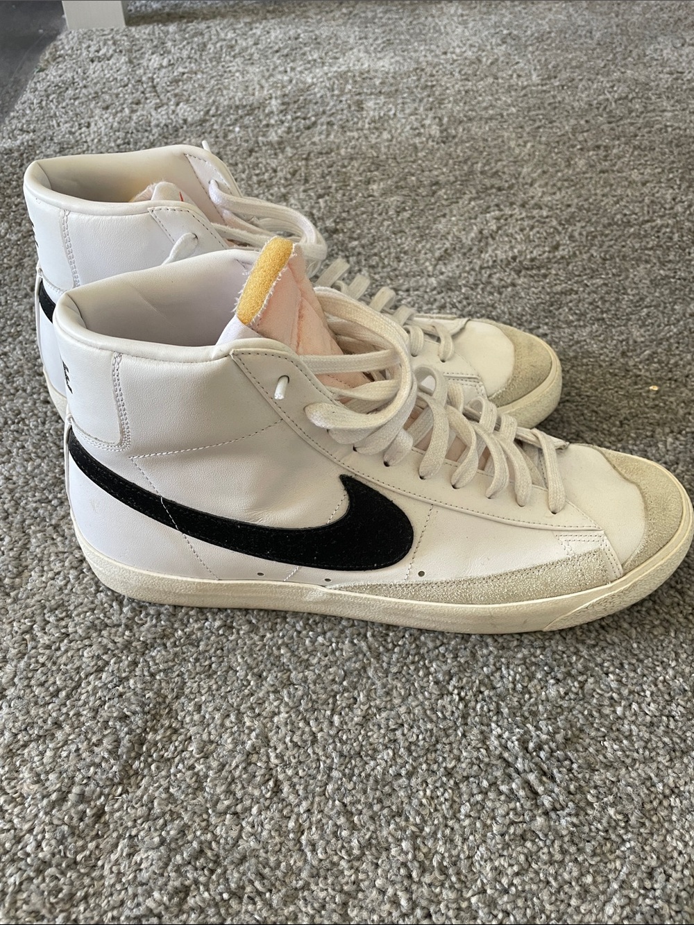 Nike White High-Top Sneakers with Black Swoosh and Cream Accents